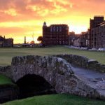 The Swilcan Bridge on the 18th fairway of the Old Course at St Andrews, representing the transition and threshold between a long journey and a meaningful finish.