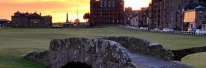 The Swilcan Bridge on the 18th fairway of the Old Course at St Andrews, representing the transition and threshold between a long journey and a meaningful finish.